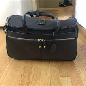 Henri Bendel jetsetter duffle wheelie bag.